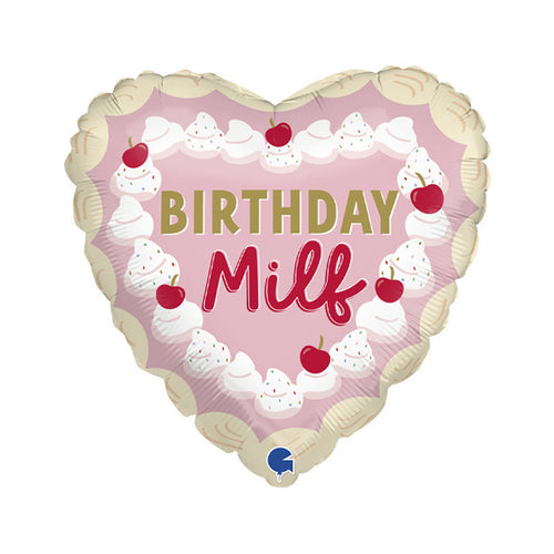 A heart shaped balloon with a pink background, dollops of creams with cherries on top and the wording 'BIRTHDAY Milf' in the middle in red and gold writing.