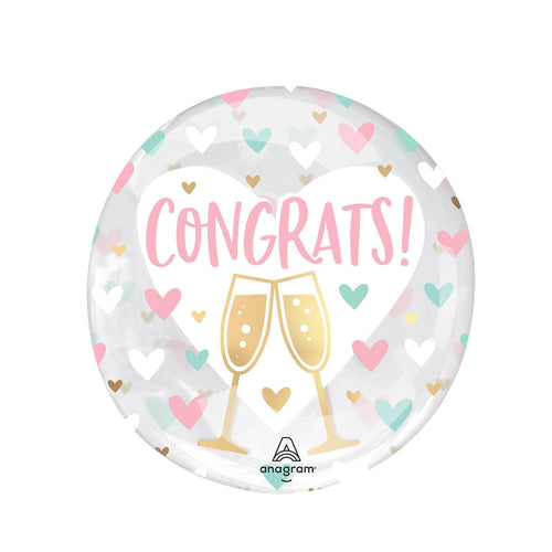 Round balloon with a transparent background featuring CONGRATS! in pink text on a white heart, next to 2 gold champagne glass shapes and lots of pink, white and turquoise hearts.