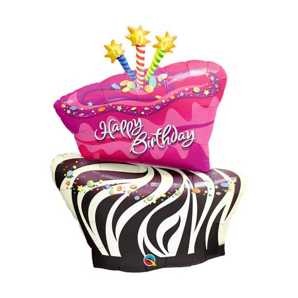 Inflatable birthday cake with pink top and zebra pattern base on a white background