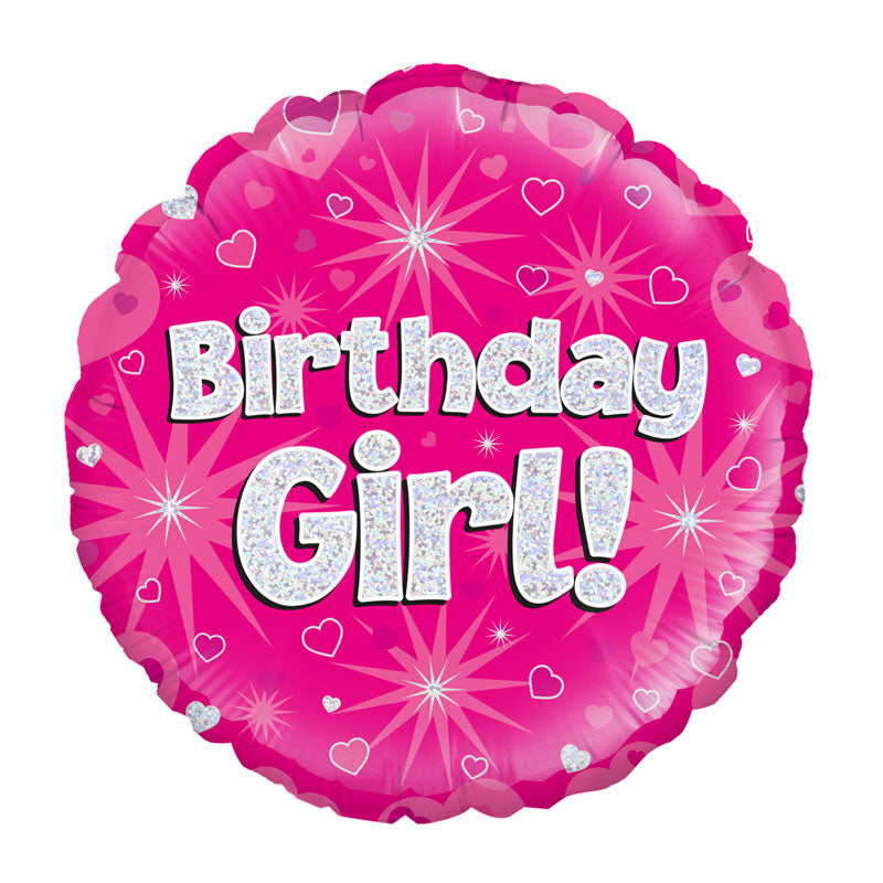 Hot pink background round balloon with red hearts and silver stars and silver writing saying 'Birthday Girl!'
