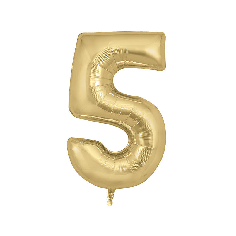Gold balloon in the shape of the number five